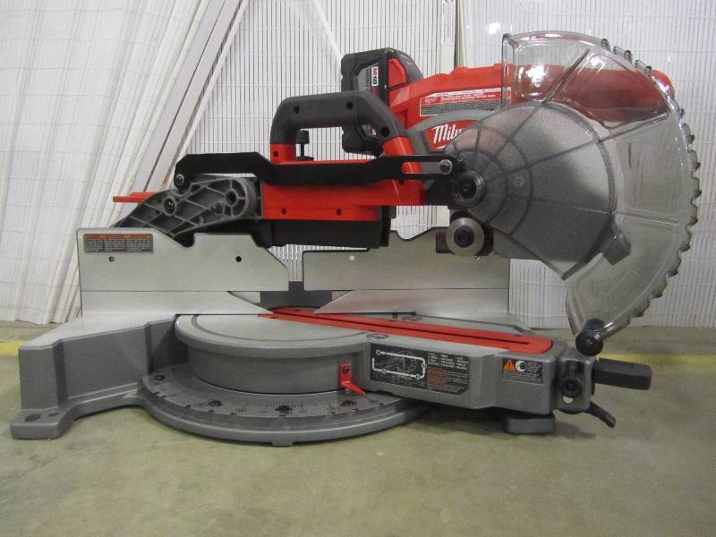 lot 9 image: Milwaukee 2734-21HD M18 18-Volt FUEL Lithium-Ion Cordless Brushless 10 in. Dual Bevel Sliding Compound Miter Saw Kit