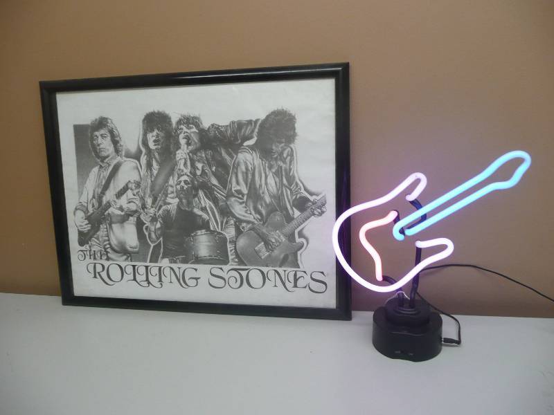 lot 25 image: VINTAGE - THE ROLLING STONES - FRAMED ART -  APPROX 25 BY 20 WITH NEON GUITAR LIGHT - LIKE NEW CONDITION - SEE PICTURES