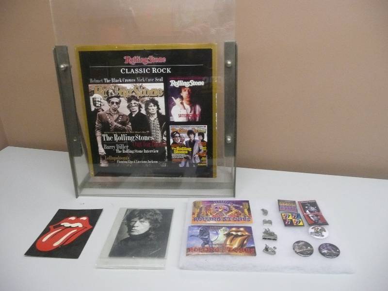 lot 26 image: ROLLING STONES COLLECTION - VINTAGE ALBUM IN HEAVY DUTY DISPLAY CASE - CONCERT TOUR PINS, BUTTONS, STICKERS & POST CARDS - GREAT PIECES - SEE PICTURES