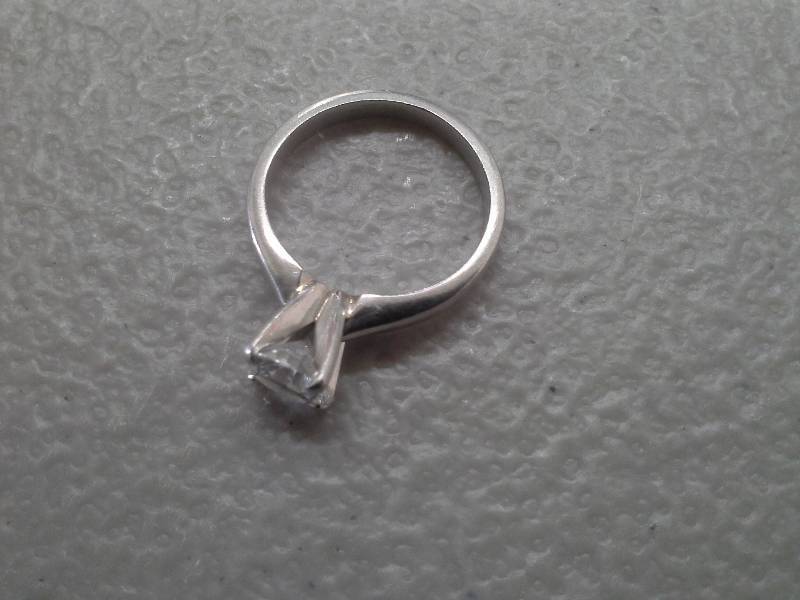 lot 49 image: Silver diamond ring