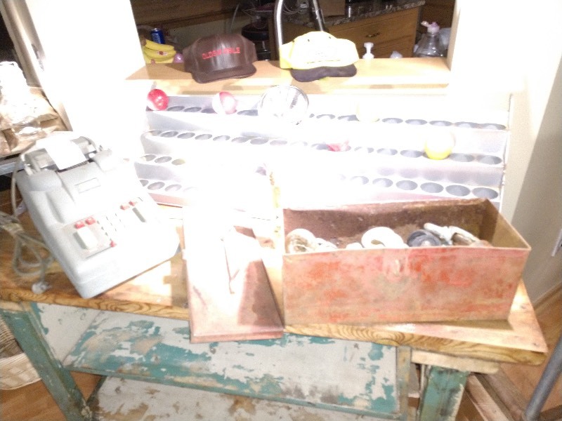 Addo X Adding Machine, Red and Yellow Lightbulbs, Oldsmobile Hat, Pennzoil Hat, Floodlight Bulb, Galvanized Parts Bin, Casters, Steampunk Flashlight and Industrial Steel Parts Display