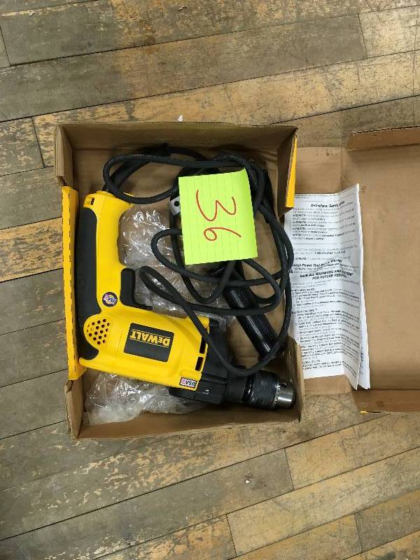 lot 36 image: DeWalt DW511 12 VSR Singlre Speed Corded Electic Hammer Drill open box in like new condition