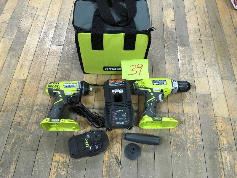 lot 39 image: Ryobi 18-Volt One  Lithium-Ion Cordless HammerDrill and Impact Driver Combo Kitwith (20 1.3Ah Bateries , Charger and Bag open box in like new condition