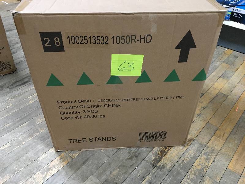 lot 63 image: Decorative Red Tree Stand for Trees up to 10 Ft Tall open box never used