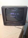 lot 15 image: Sylvania TV with DVD and VHS