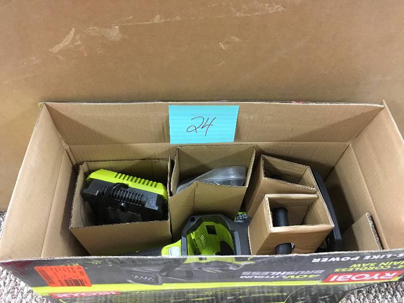 Ryobi 14 in. 40 Volt Brushless Lithium- Ion Cordless Chainsaw Battery and Charger inculded Open Box not used