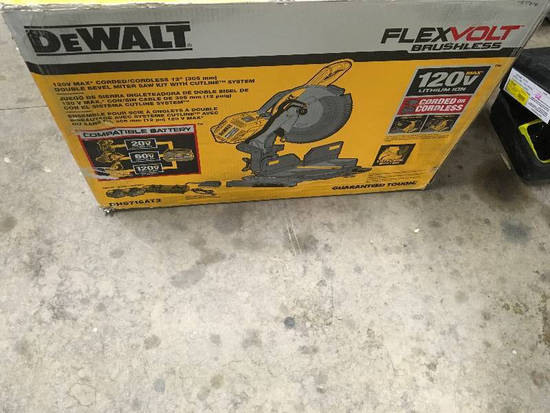 Dewalt FLEXVOLT 120-Volt MAX Lithium-Ion Cordless Brushless 12 in. Miter Saw with AC Adapter, (2) Batteries 6Ah and Charger Model DHS716AT2 not used