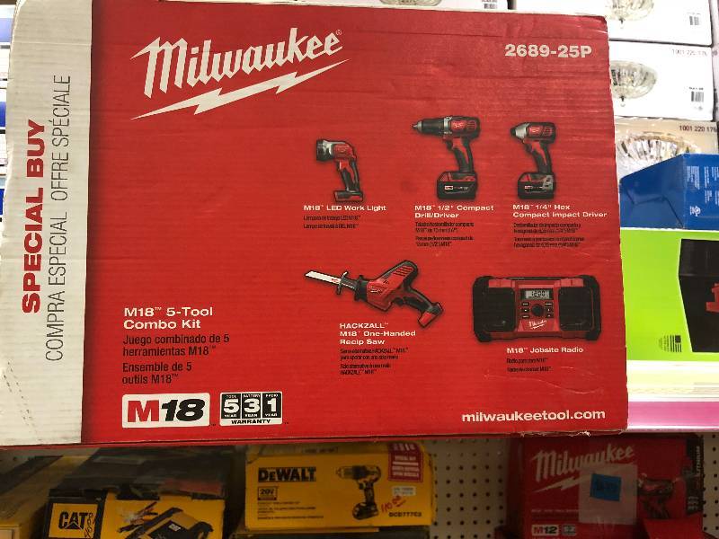 Milwaukee M18 18-Volt Lithium-Ion Cordless Combo Tool Kit (5-Tool) w(2) 3.0Ah Batteries, (1) Charger, (1) Tool Bag open box never used