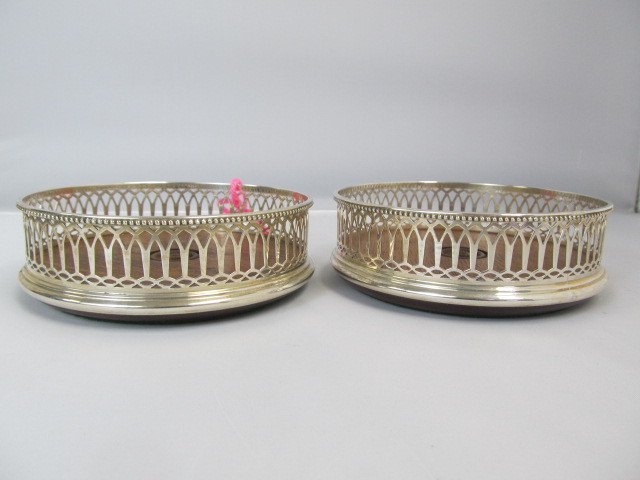 lot 5 image: Pair of Antique Hallmarked English Sterling Silver Wine Coasters