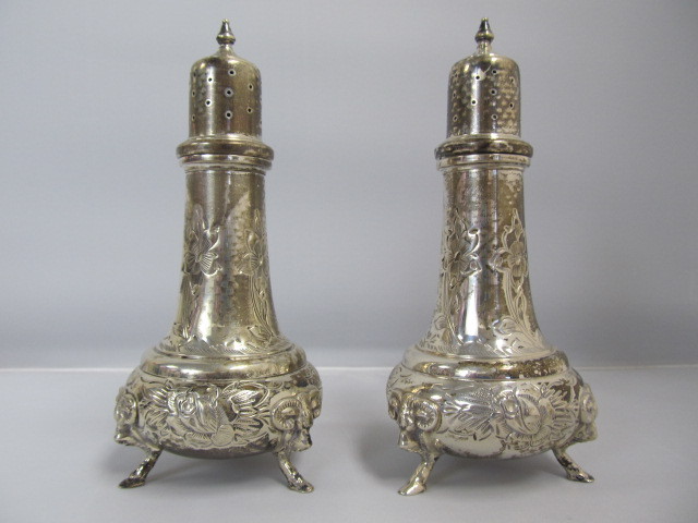 lot 19 image: Pair of Antique RAMS HEAD Footed Sterling Silver Salt & Pepper Shakers