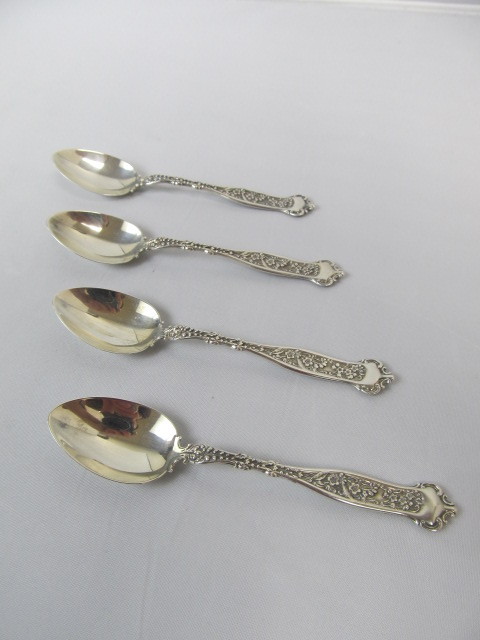 lot 29 image: Set of 4 Antique Hallmarked Sterling Silver Demitasse Spoons