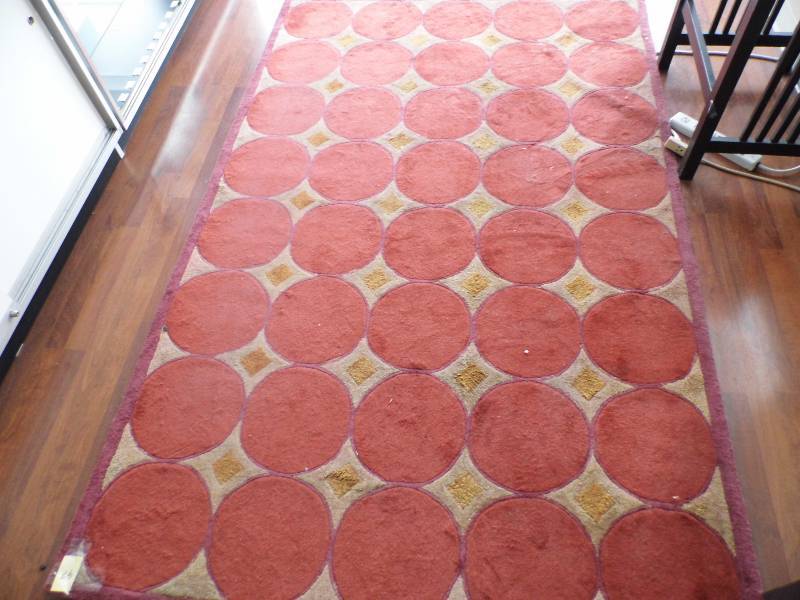Rug w Rust Colored Circles