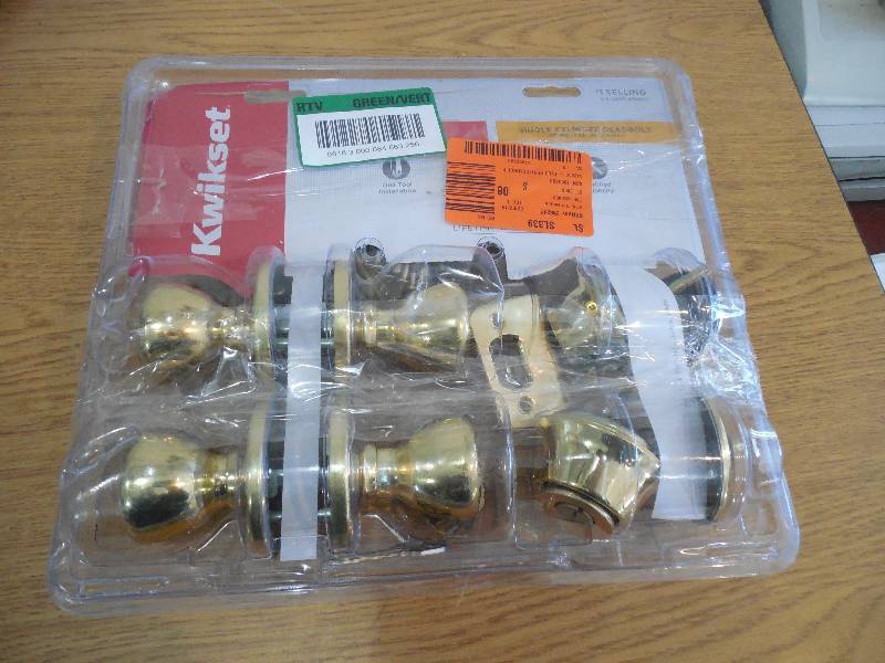 lot 18 image: Kwikset Tylo Polished Brass Exterior Entry Door Knob and Single Cylinder Deadbolt Project Pack