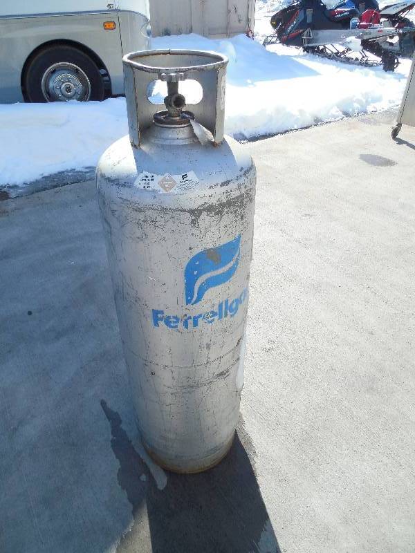 lot 57 image: 100 POUND PROPANE TANK