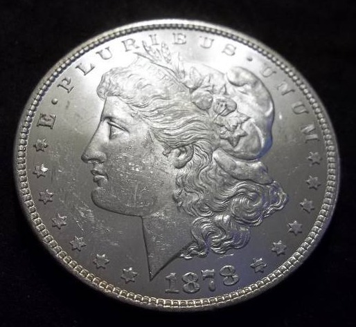 1878  Morgan Silver Dollar 7 TF Rev. 1879
