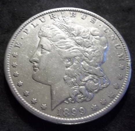 1899 O Morgan Silver Dollar