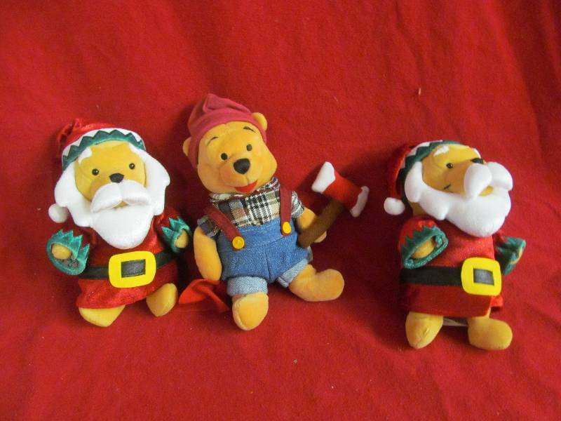 lot 108 image: Winnie the Pooh plush toys