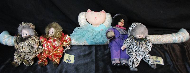 lot 85 image: Classic Treasures Porcelein Dolls and Door Draft Blocker