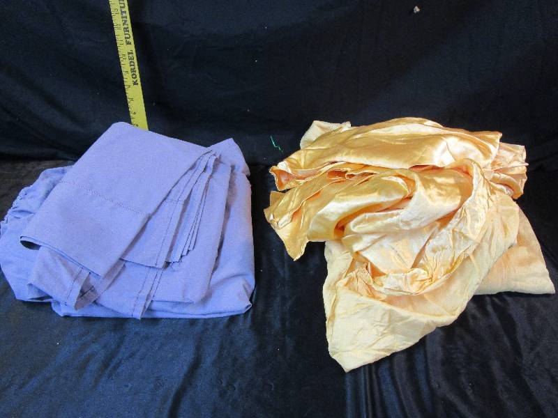 lot 96 image: Twin sheet sets lavandar and orangish, Satin has 2 pillow cases