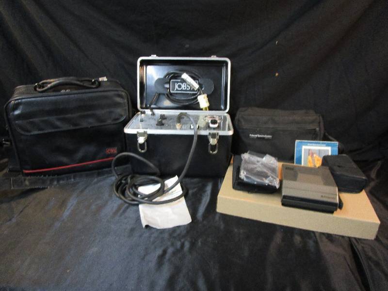 lot 102 image: Compression Unit, Polaroid Camera and Bag