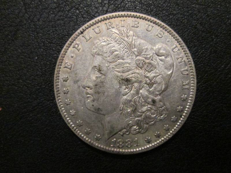 1881 O Morgan Dollar...