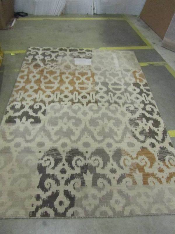 lot 43 image: 63in x 90in area rug