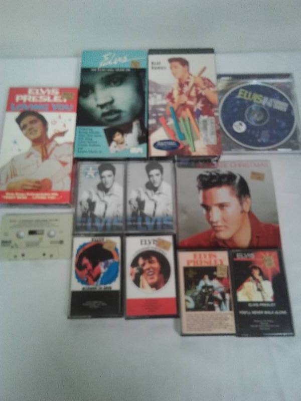 lot 21 image: Elvis Presley Music, VHS, Cassette, Cds (11 in all)