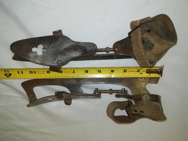 lot 40 image: Antique Steel ice skates with leather