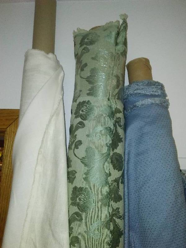 lot 102 image: 3 bolts of upholstery fabric and remnants