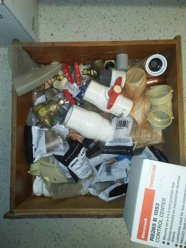 lot 123 image: Honeywell Control Center, brass, watts fittings and shut off valves, poly check valve and more