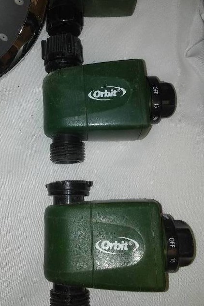 lot 136 image: Misc. Plumbing, Orbit outdoor water times (3) and more