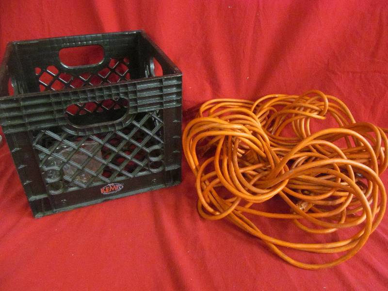lot 64 image: Kemps milk crate, Extension cord