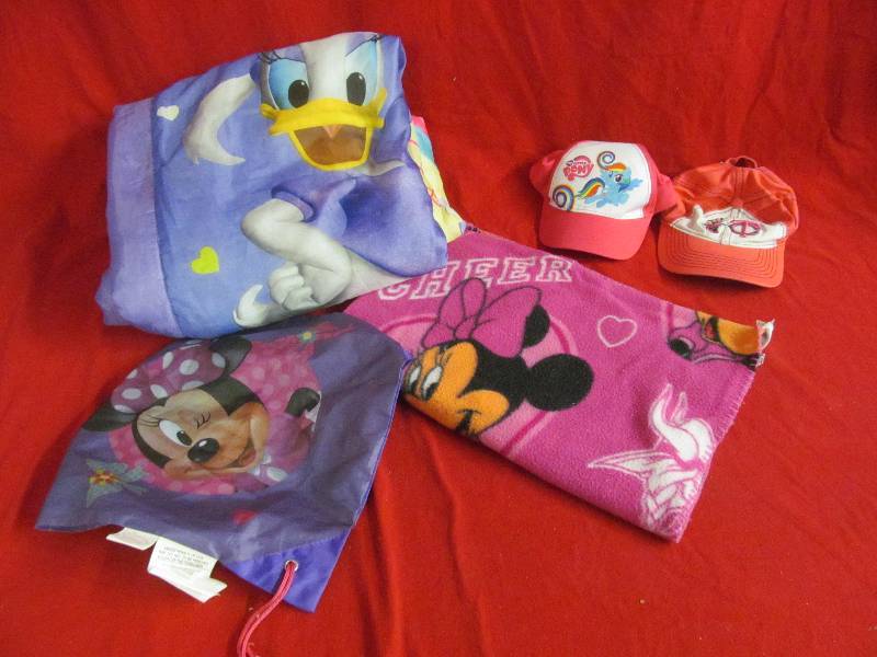 lot 67 image: childs sleeping bag, blanket, caps, bag