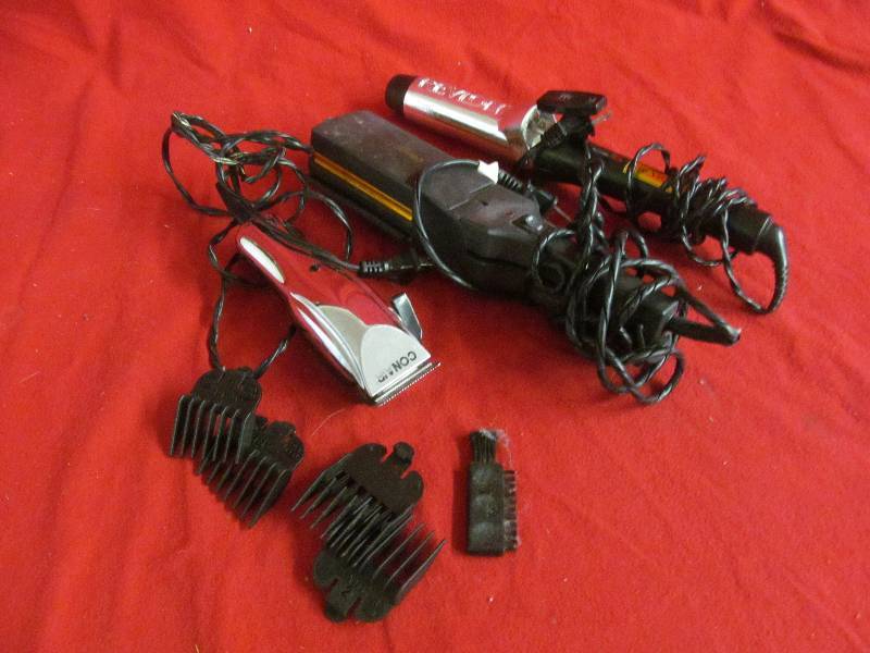 lot 75 image: Conair clippers, Conair straightener, Revlon curler