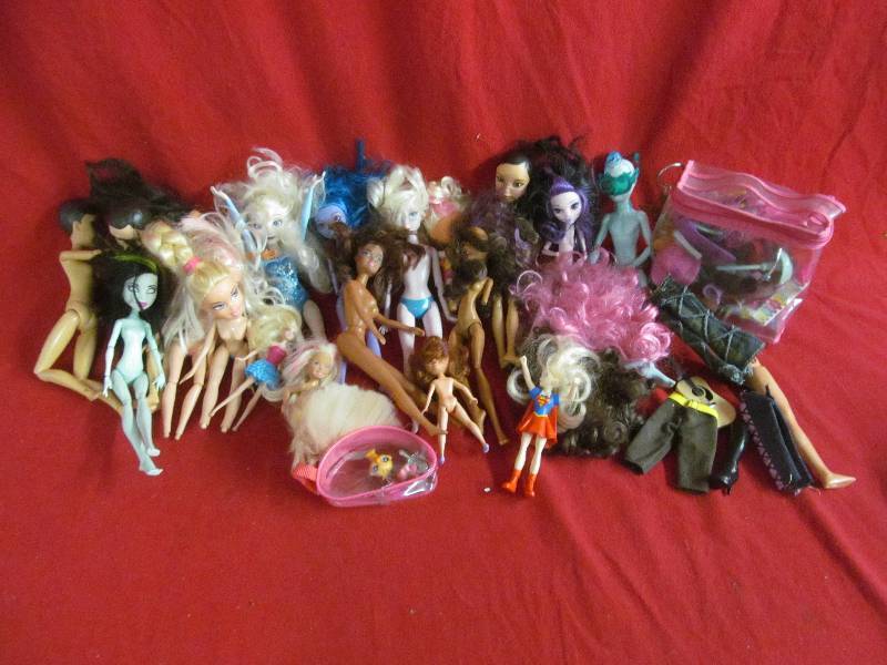 lot 85 image: dolls, accessories, clothes