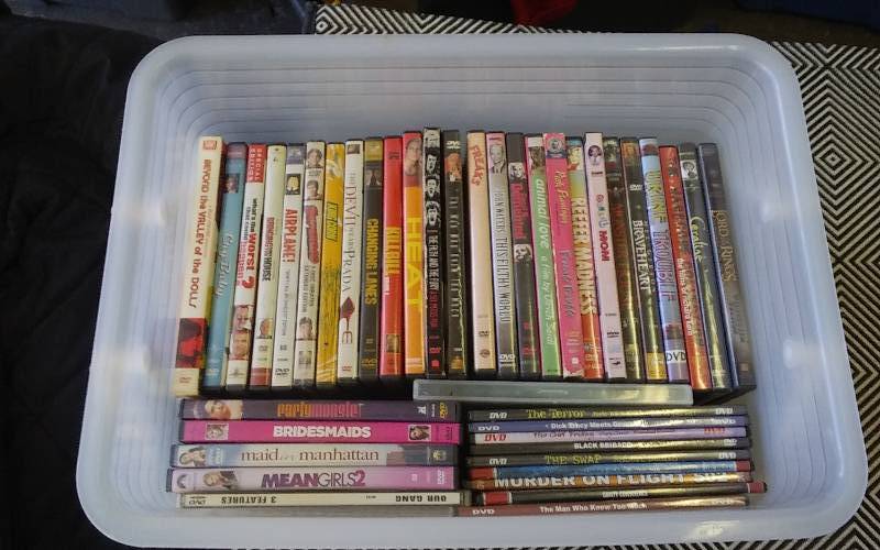 lot 24 image: 40 DVDs & Carry Tote
