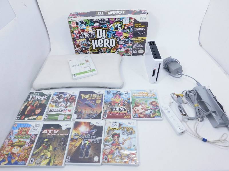 lot 14 image: Wii System, Games, Wii Fit and DJ Hero