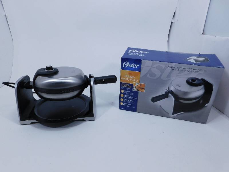 lot 27 image: Oster Titanium Infused DuraCeramic Stainless Steel Flip Waffle Maker