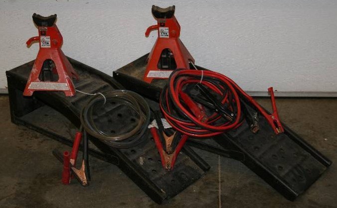 lot 23 image: Car Ramps, Jumper Cables, and Jack Stands
