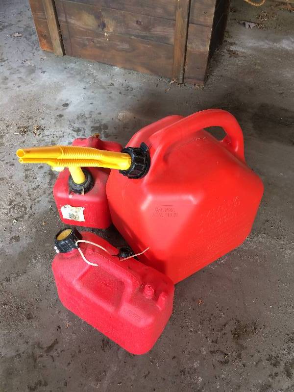 lot 12 image: Lot of 3 Gas Cans - Large One Has Gas In It