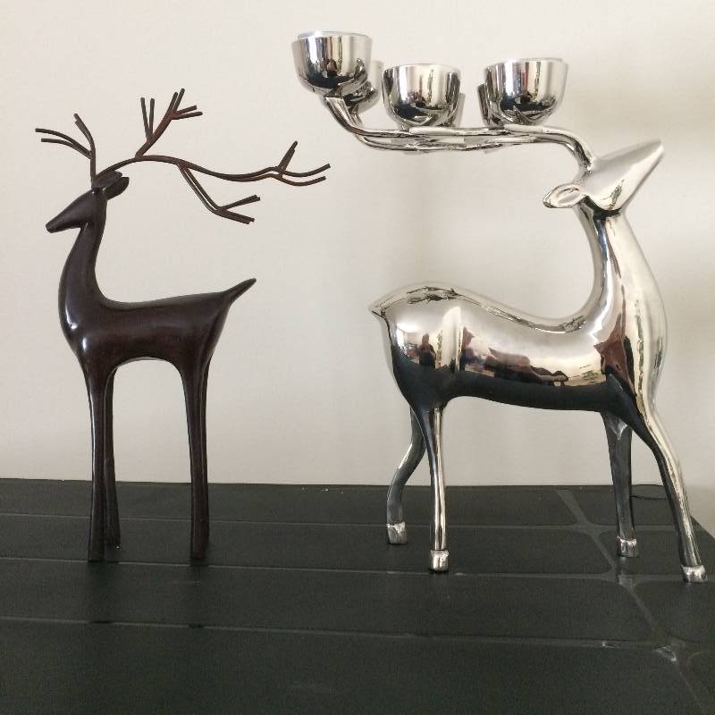 lot 36 image: Pottery Barn Reindeers - Lot Of 2 - 1 Is A Candleholder & 1 Is Heavy Bronze - Excellent Condition