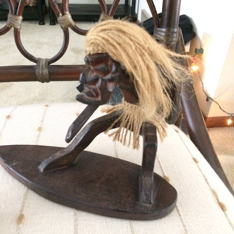 lot 48 image: Wood Carved Native Surfer Dude With The Look On His Face When Company Arrives Unexpectedly...His Pal The Moose Bobblehead Is There To Cheer Him Up - Both Excellent Condition