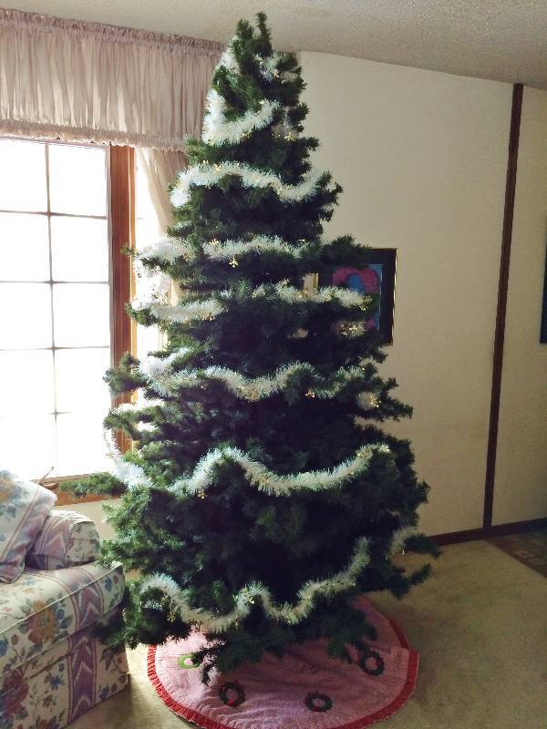 lot 81 image: 8 Foot Christmas Tree - Comes apart in a couple sections - Really Nice & Full
