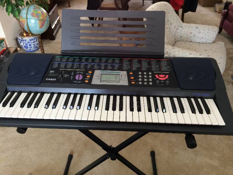 lot 82 image: Casio CTK-501 Keyboard - Like New Condition Comes with Stand & Carrying Case