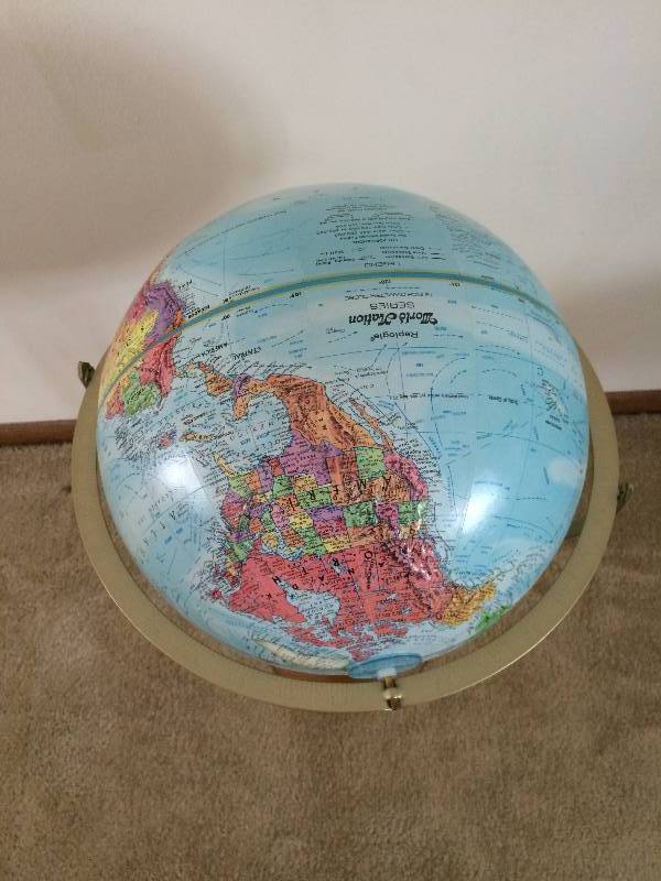 lot 97 image: Vintage World Globe On Wood Stand