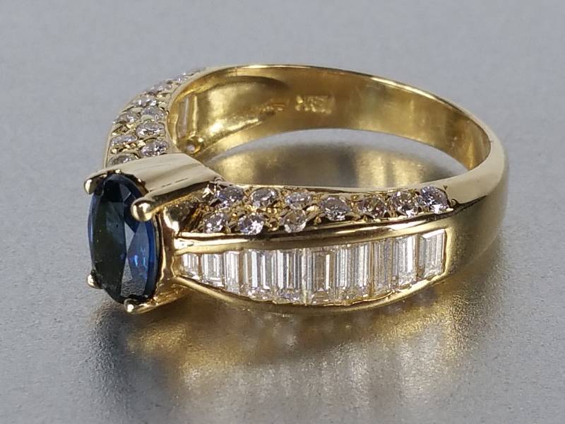 lot 7 image: Sapphire and Diamond Ring in 18k Gold - $6800 Retail