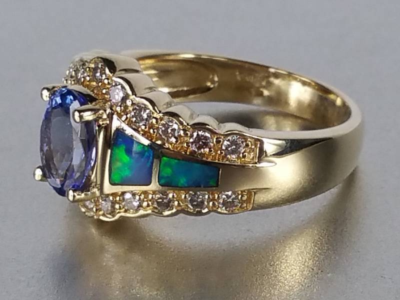 lot 8 image: Tanzanite, Opal, and Diamond Ring in 14k Gold - $3900 Retail