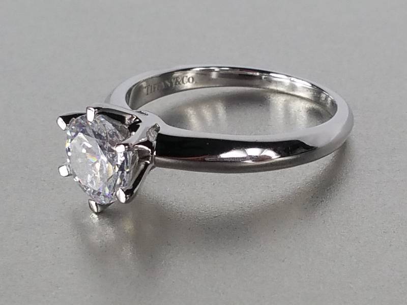 lot 10 image: Tiffany & Co. 2 ct White Sapphire Ring in 18k Gold - $3200 Retail