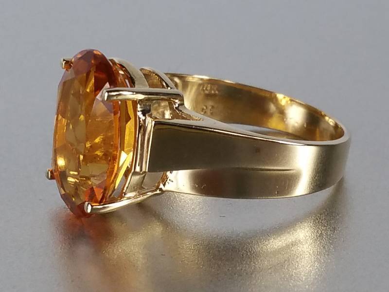 lot 58 image: 4 ct Orange Sapphire in 10k Gold