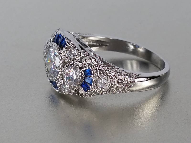 lot 78 image: Blue and White Sapphire Ring
